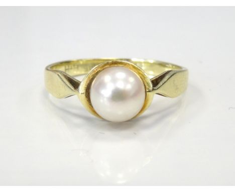 PEARL DRESS RINGon fourteen carat gold shank, ring size J