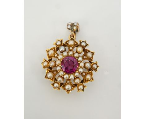 VICTORIAN PINK GEM AND SEED PEARL SET BROOCH/PENDANTpossibly a pink sapphire, the central gem stone in multi pearl surround, 