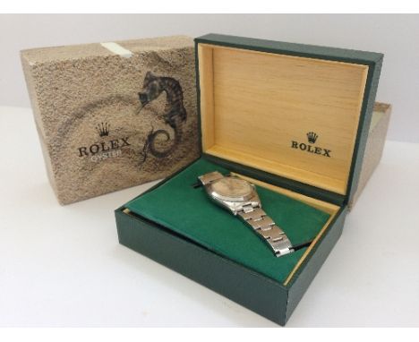 A gentleman's Rolex Oyster perpetual date adjust chronometer wristwatch, Model No. 15H830/104 on original stainless steel str