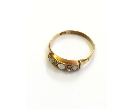 A ladies' 18 carat gold opal and diamond set dress ring.