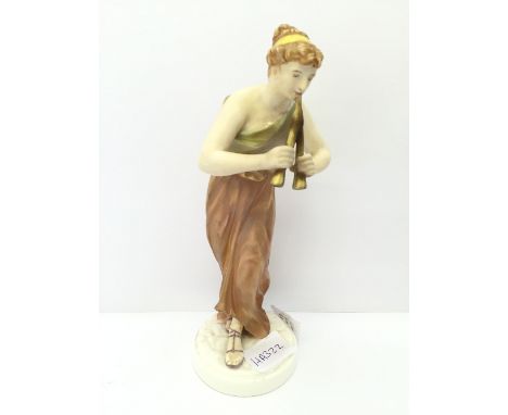 A Royal Worcester bone china figure modelled as a Female.