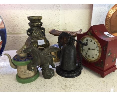 A collection of various Oriental items to include a red lacquer Chinoiserie style mantle clock, decorated with Chinese figure