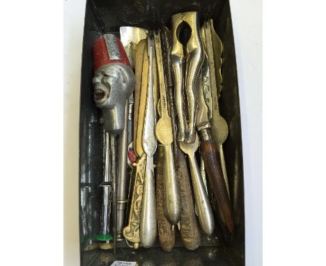 A collection of various silver plated cutlery items and various tools.
(R6)
