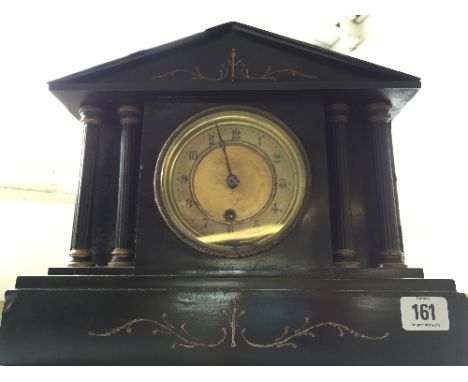 A black slate architectural mantle clock.