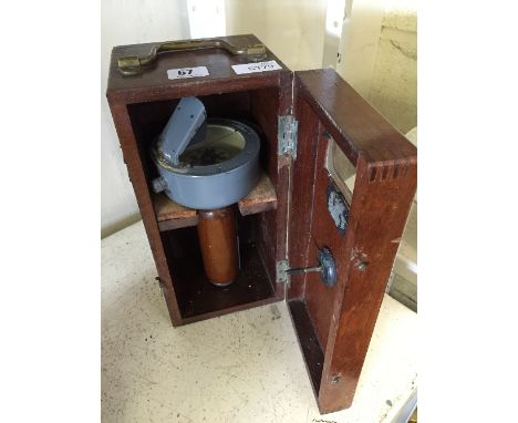 A mahogany cased ship's compass by G. E. O. Wilson & Co., London.
(R5)