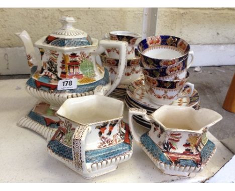 An early 20th century blue and white painted tea and coffee service.
