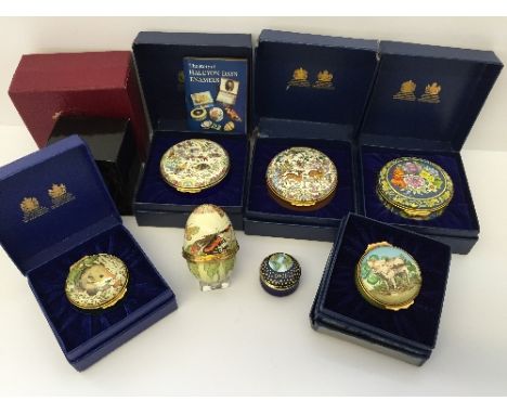 Six various Halcyon Days enamel china boxes in original presentation boxes together with a similar china egg pill box.