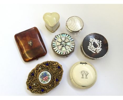 A small silver and tortoiseshell circular box together with a tortoiseshell matchbox holder, a small gilded ovoid shape box w