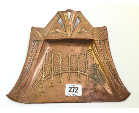 An Arts & Crafts Art Nouveau copper crumb sweep dish in the style of Liberty.