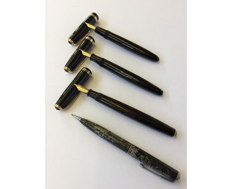 A vintage Parker Vacumatic fountain pen with transparent body and 14 carat feathered nib together with two Parker Duofolds wi