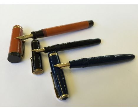 Three vintage Parker fountain pens to include a large Big Red Lucky Curve with a large 14 carat gold nib together with a Park