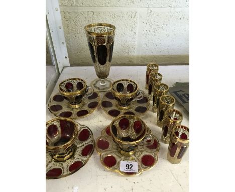 A fine 19th century Bohemian glass coffee and liqueur set comprising four coffee cups and saucers and six liqueur glasses, de