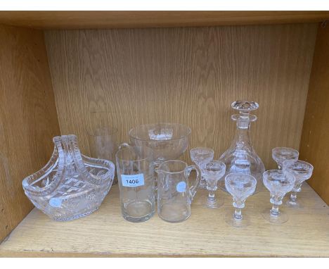 AN ASSORTMENT OF GLASS WARE TO INCLUDE A DECANTER, SHERRY GLASSES AND A POSIE BASKET ETC 
