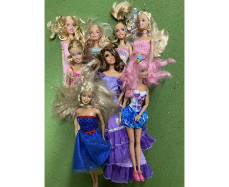 A BAG OF EIGHT MATTEL DOLL FIGURES 