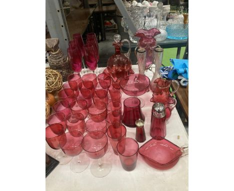 A LARGE QUANTITY OF CRANBERRY GLASS TO INCLUDE DRINKING GLASSES, VASES, JUGS, DECANTER, ETC., 