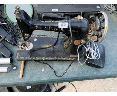 A VINTAGE SINGER SEWING MACHINE CONVERTED TO ELECTRIC 