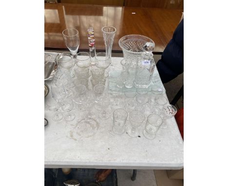 AN ASSORTMENT OF GLASS WARE TO INCLUDE A DECANTER, VASES AND SHERRY GLASSES ETC 
