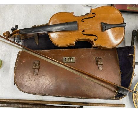 A VINTAGE VIOLIN AND BOW IN LEATHER CARRY CASE 