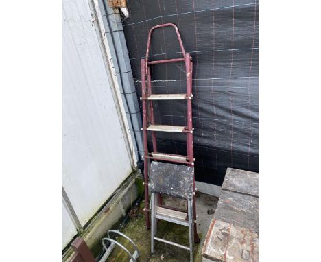 A TUBULAR METAL STEP LADDER AND A KITCHEN STEP STOOL 