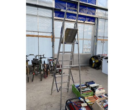 A LARGE SIX RUNG ALUMINIUM STEP LADDERS 