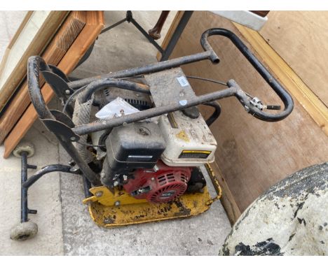 A POETROL RENGINE WACKER PLATE WITH HONDA ENGINE 