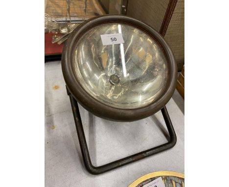 A VINTAGE RAILWAY LAMP ON STAND 