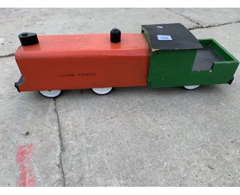 A VINTAGE WOODEN MODEL TRAIN 