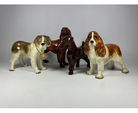A GROUP OF FOUR COOPERCRAFT CERAMIC DOG FIGURES 