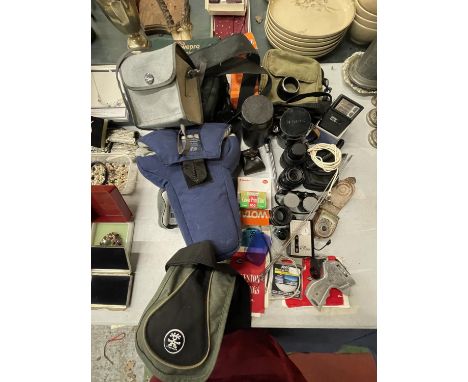 A LARGE QUANTITY OF CAMERA ACCESSORIES TO INCLUDE LENSES, A LIGHT METER, FLASH, BAGS, FILM, ETC 