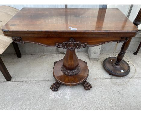 A REGENCY ROSEWOOD FOLD-OVER CARD TABLE ON PLATEAU BASE WITH CLAW FEET, 36" WIDE 
