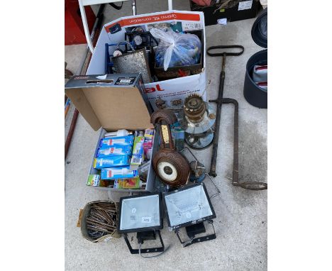 AN ASSORTMENT OF ITEMS TO INCLUDE A BAROMETER, AN OIL LAMP AND LIGHT BULBS ETC 