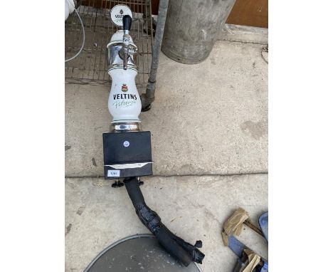 A CERAMIC 'VELTINS PILSENER' BEER PUMP 