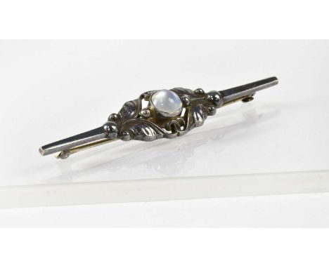 GEORG JENSEN; a sterling silver bar brooch set with a moonstone, design no. 224, length 6cm, approx. 0.18ozt.