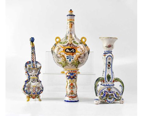 A small group of 19th century Continental ceramics comprising a moon flask, a model of a cello with floral decoration, a cand