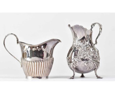CHARLES THOMAS FOX &amp; GEORGE FOX; a Victorian hallmarked silver cream jug of baluster form with chased Rococo-style decora
