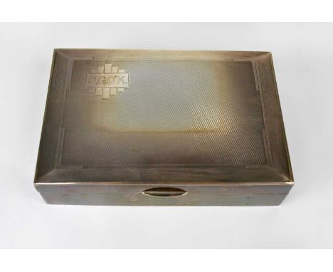 A George VI hallmarked silver cigarette box of rectangular form, with engine turned lid and Art Deco stylised cartouche, insc