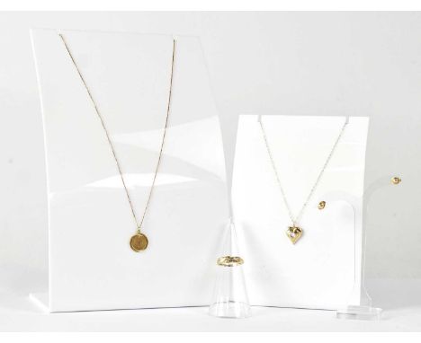A group of 9ct yellow gold jewellery comprising a dress ring set with three tiny diamonds, size P, a pair of spherical stud e