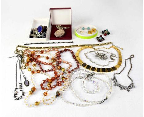 A group of vintage costume jewellery, to include a large hallmarked silver oval locket by Fred Manshaw, approx. 5.5 x 4.3cm, 