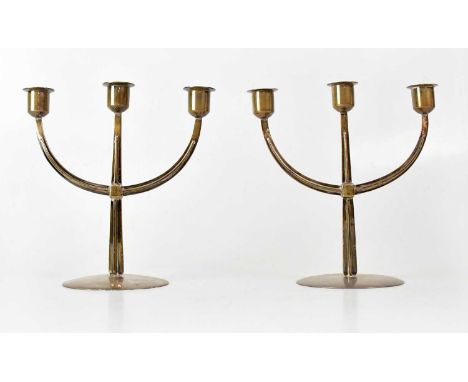 ELKINGTON &amp; CO LTD; a pair of Elizabeth II hallmarked silver three-branch candlesticks, height 20cm, Birmingham 1960, com