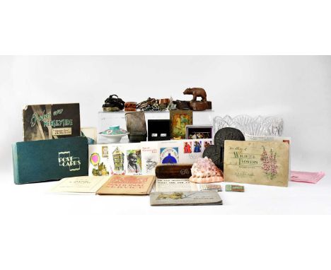 A collectors' lot to include a small quantity of costume jewellery, an Indian white metal cigarette case, a bog oak pipe stan