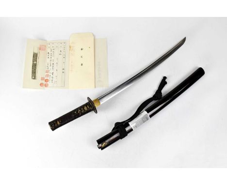 A Muromachi period Kane Aki wakizashi, with 48cm grooved blade, tang unsigned, maker attributed through attached papers, and 