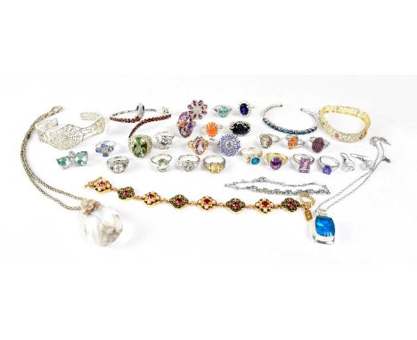 A group of 925 silver jewellery, to include a hinged bangle in the form of a snake, set with red stones, a bangle set with pa