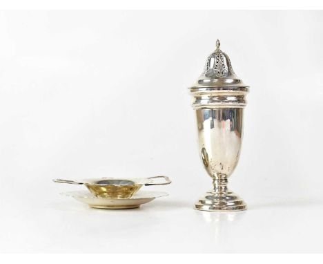 E. HILL; a George V hallmarked silver sugar sifter, Birmingham 1920, height 16cm, and a hallmarked silver tea strainer and st