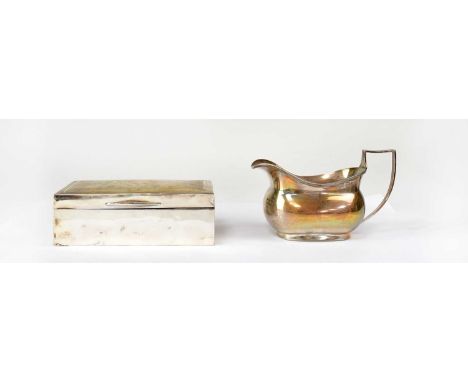 BARKER BROTHERS SILVER LTD; a George VI hallmarked silver milk jug with reeded borders, Birmingham 1938, approx. 4.5ozt, toge