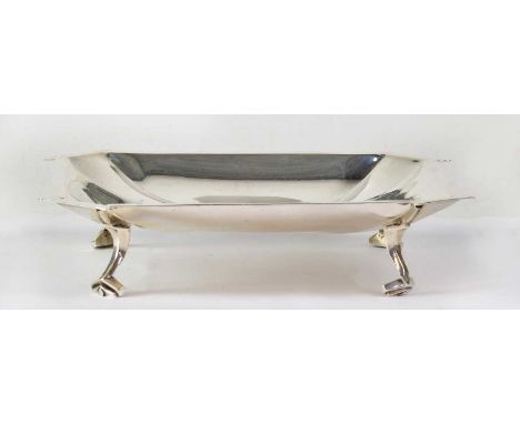 HARRISON BROTHERS AND HOWSON; a George VI Art Deco hallmarked silver salver of square form with canted corners, raised on fou