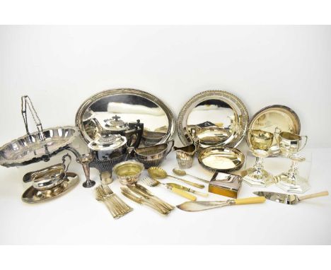 A quantity of silver-plated items including a three-piece tea set, short candlestick, trays with pierced edge, cigarette box,