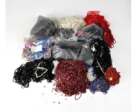 A quantity of mainly strung bugle beads for jewellery making/crafts, together with a quantity of loose seed beads, necklace c