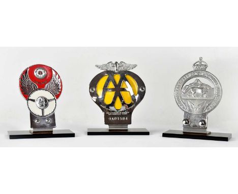 Three vintage car badges comprising The Royal East African Automobile Association, no. L8377, a red and white enamelled examp