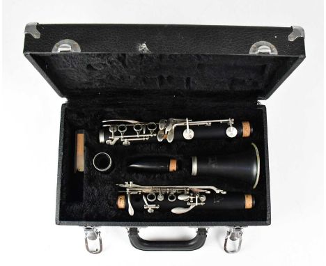 A cased Arbiter Pro Sound clarinet, cased.