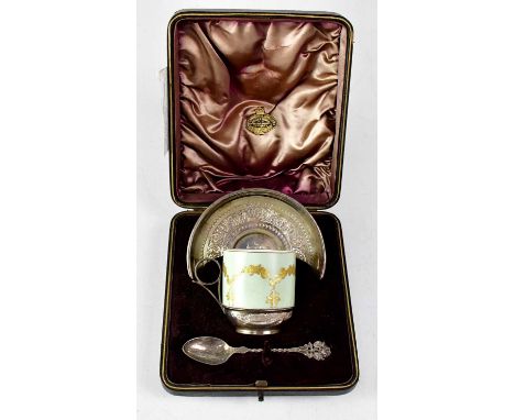 VALE BROTHERS &amp; SERMON; a Victorian hallmarked silver mounted demitasse cup and saucer set with gilt-heightened decoratio